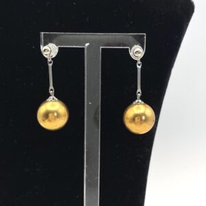 Boucles d'oreilles avec pendant boule dorée